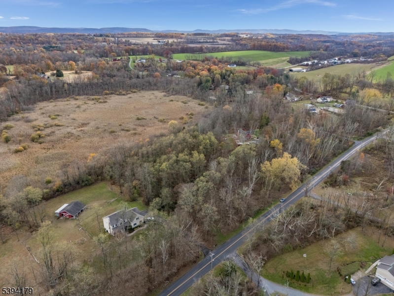 143 Vail Road Columbia, NJ 07832 - Photo 2 of 15 a view of a lake with a mountain