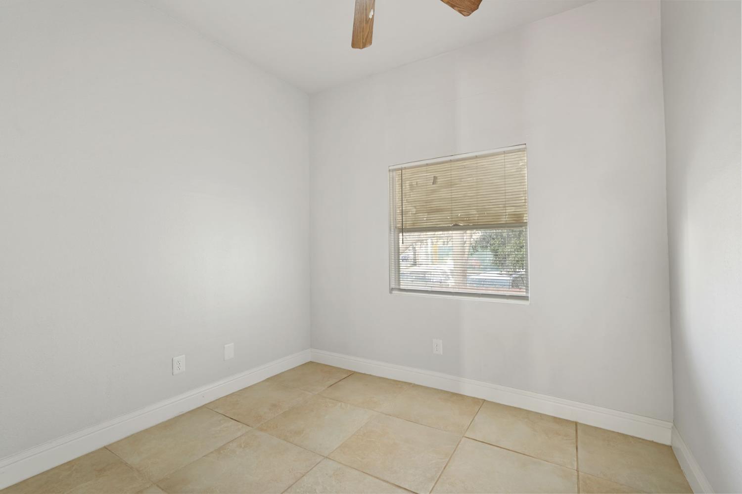715 North Sutter Street Stockton, CA 95202 - Photo 17 of 51 an empty room with windows
