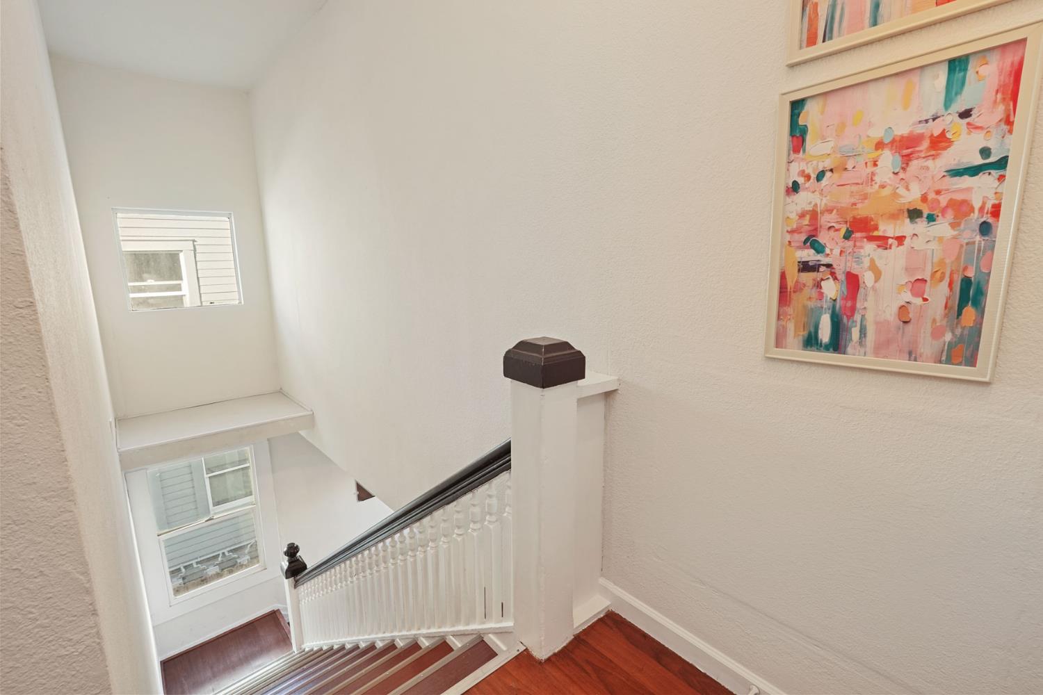 715 North Sutter Street Stockton, CA 95202 - Photo 20 of 51 a view of entryway with stairs and wooden floor