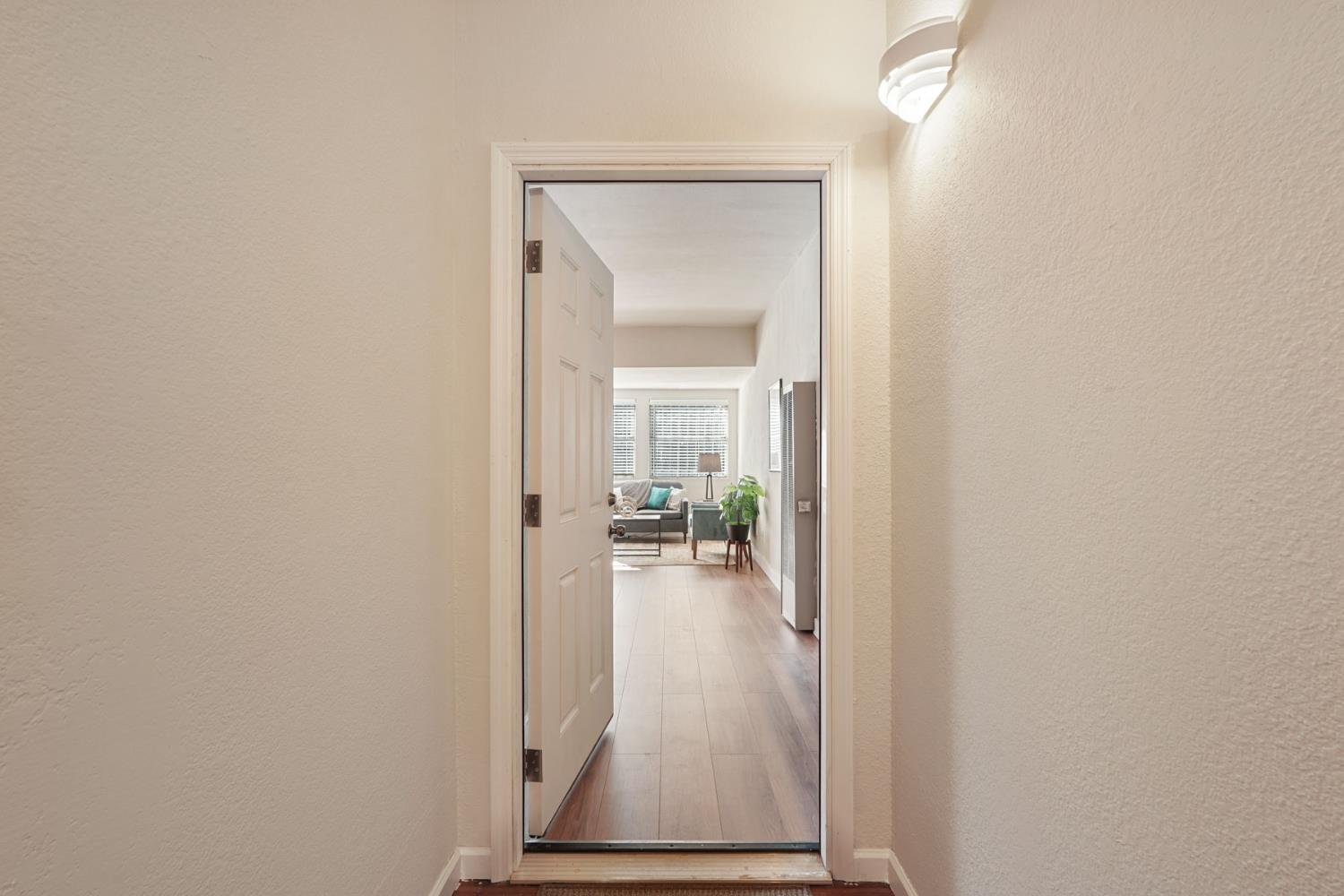715 North Sutter Street Stockton, CA 95202 - Photo 35 of 51 a view of a livingroom from a hallway