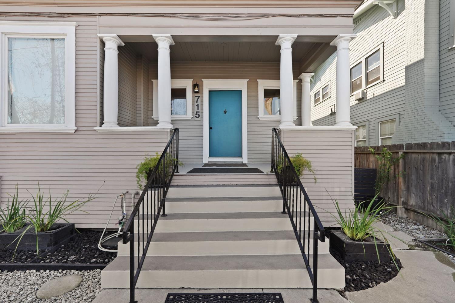 715 North Sutter Street Stockton, CA 95202 - Photo 6 of 51 a view of a house with a potted plant and stairs