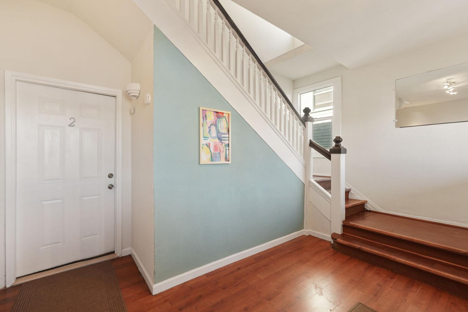 715 North Sutter Street Stockton, CA 95202 - Photo 8 of 51 a view of an entryway with wooden floor