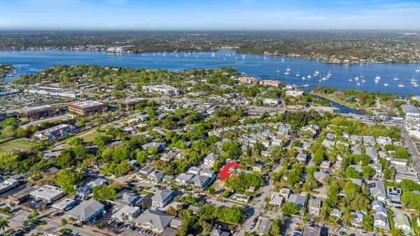 an aerial view of residential building with parking space
