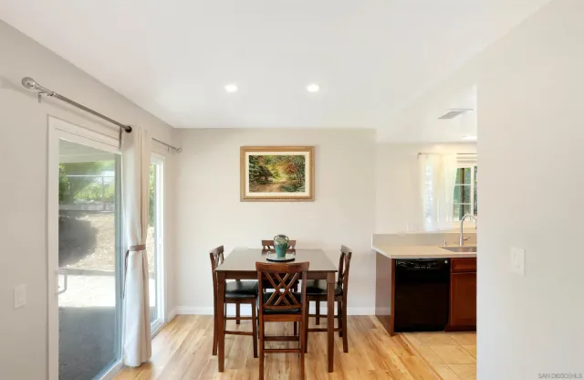 a bathroom with a shower and a sink