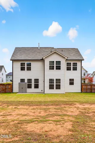 a view of a house with a swimming pool