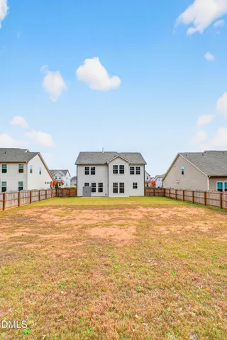 front view of house with a swimming pool