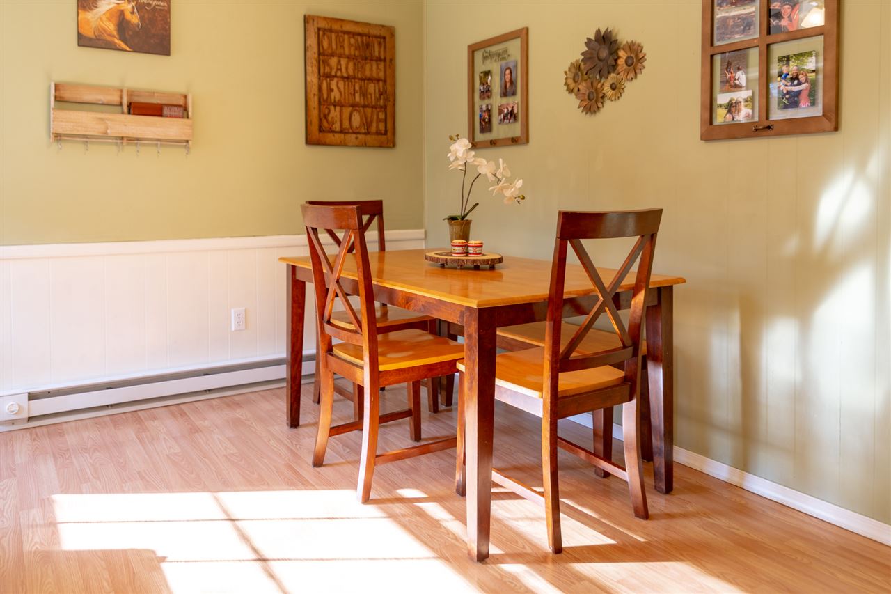 3391 Oak Ridge Road Mount Crawford, VA 22841 - Photo 11 of 27 a dining room with furniture and wooden floor