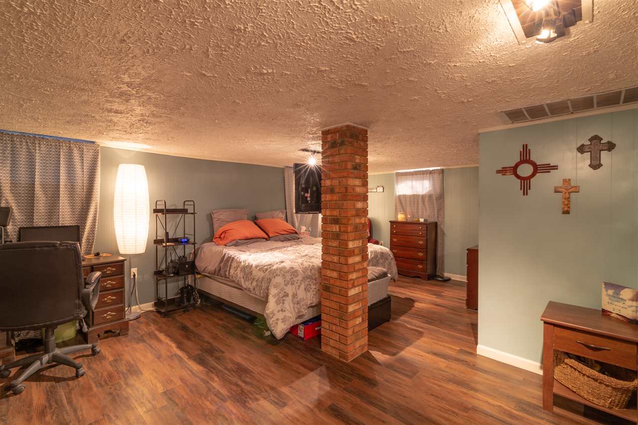 3391 Oak Ridge Road Mount Crawford, VA 22841 - Photo 5 of 27 a bed room with a bed and a chair