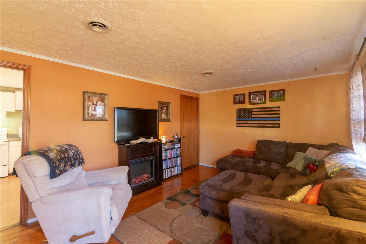 3391 Oak Ridge Road Mount Crawford, VA 22841 - Photo 6 of 27 a living room with furniture and a flat screen tv