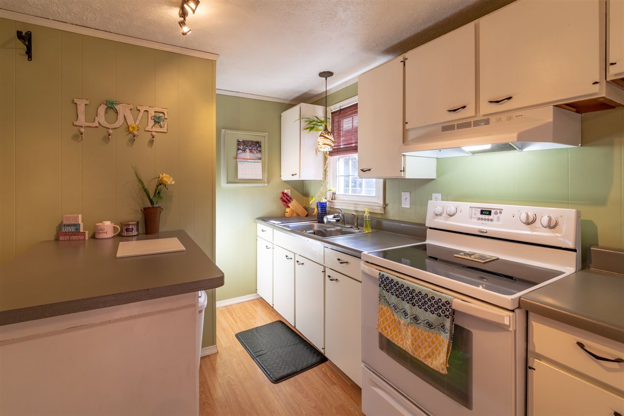 3391 Oak Ridge Road Mount Crawford, VA 22841 - Photo 8 of 27 a kitchen with a stove and a sink