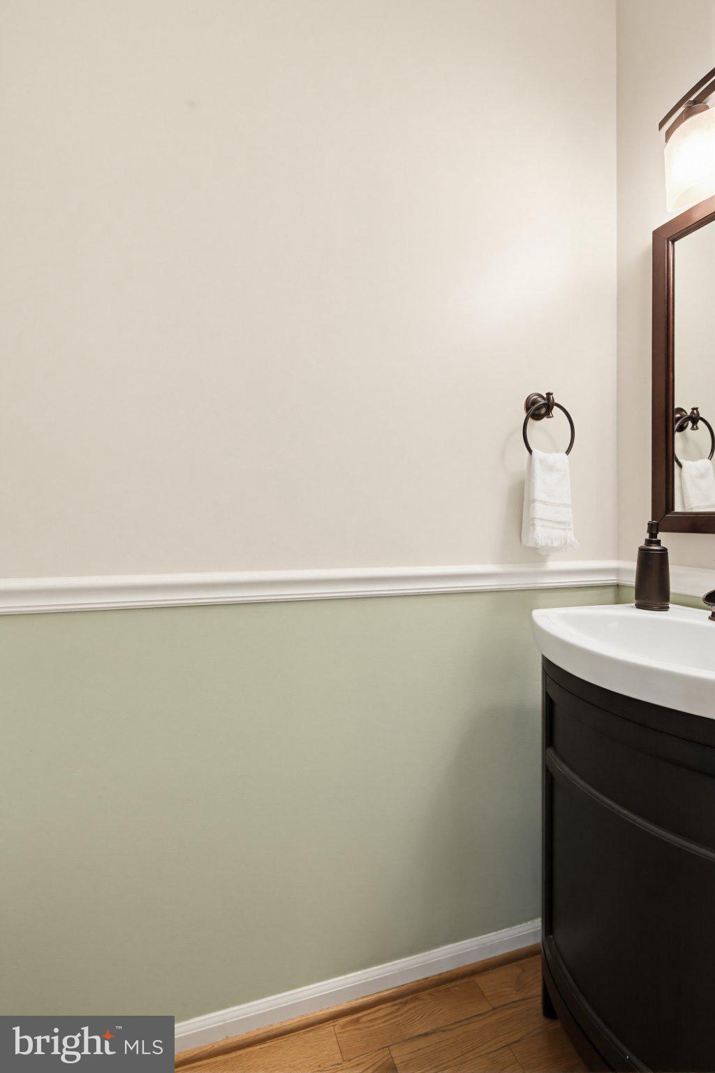 6516 Milva Lane Springfield, VA 22150 - Photo 12 of 35 Elegant half-bath with subtle charm.