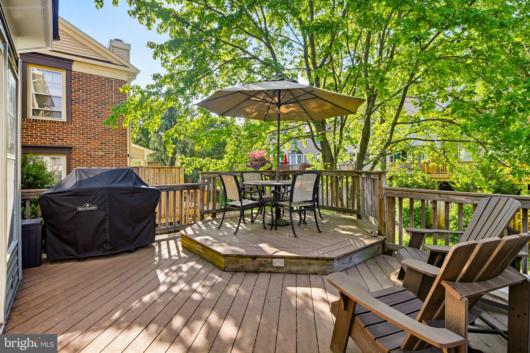 6516 Milva Lane Springfield, VA 22150 - Photo 31 of 35 Sunny deck oasis under leafy trees.