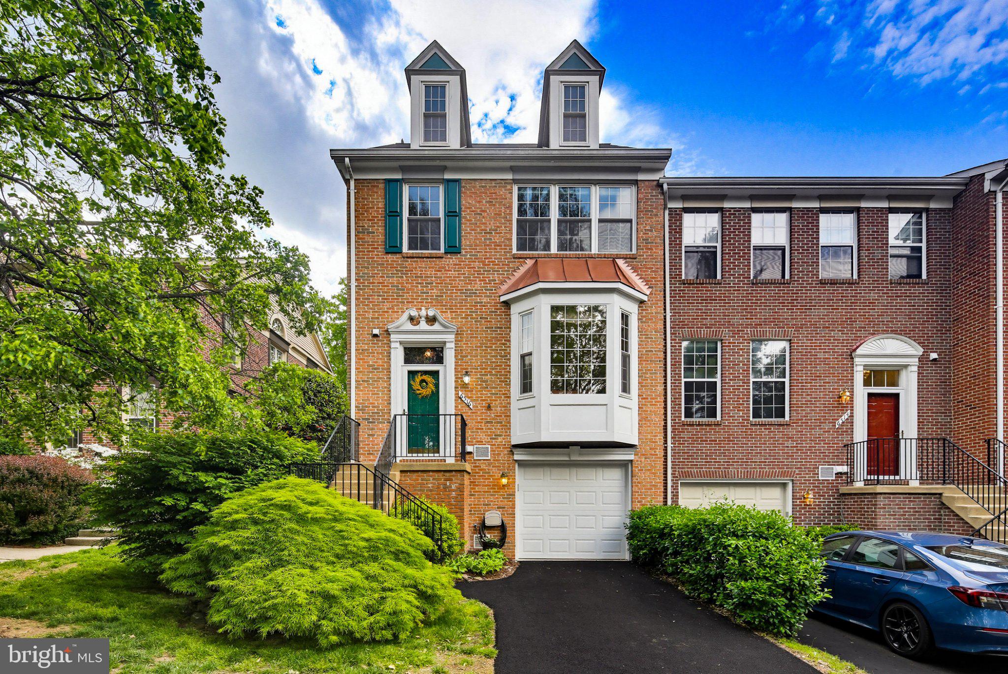 6516 Milva Lane Springfield, VA 22150 - Photo 35 of 35 Charming brick townhouse with greenery.