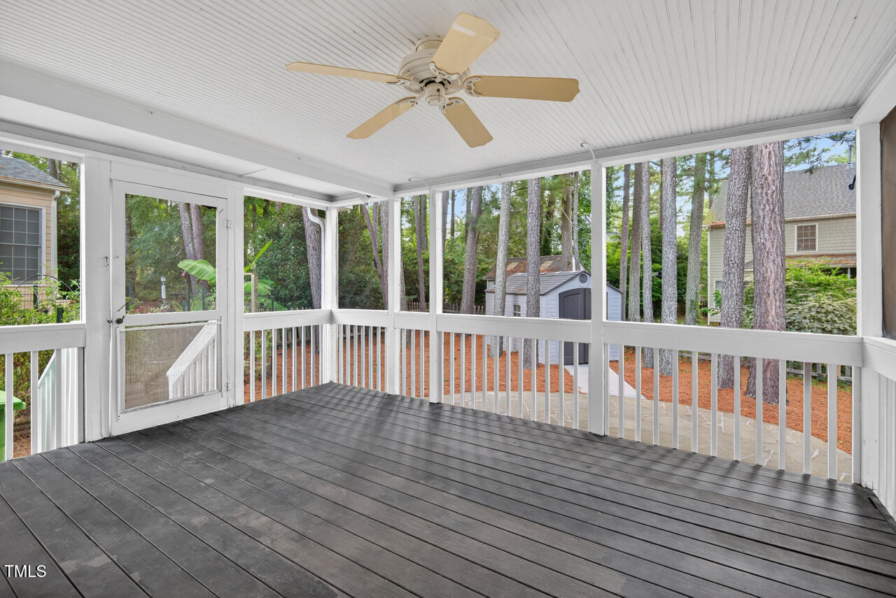 8825 Kirkstall Court Raleigh, NC 27615 - Photo 25 of 49 a view of a porch with wooden floor