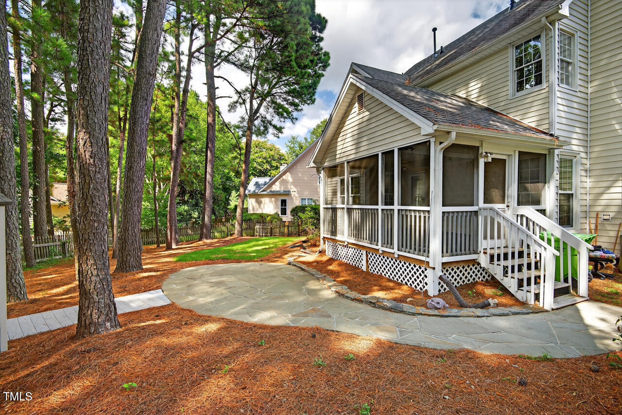 8825 Kirkstall Court Raleigh, NC 27615 - Photo 45 of 49 a view of backyard with deck