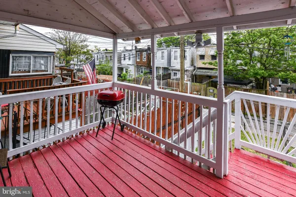 a view of a two chairs on the roof deck