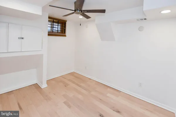 a view of small space with wooden floor