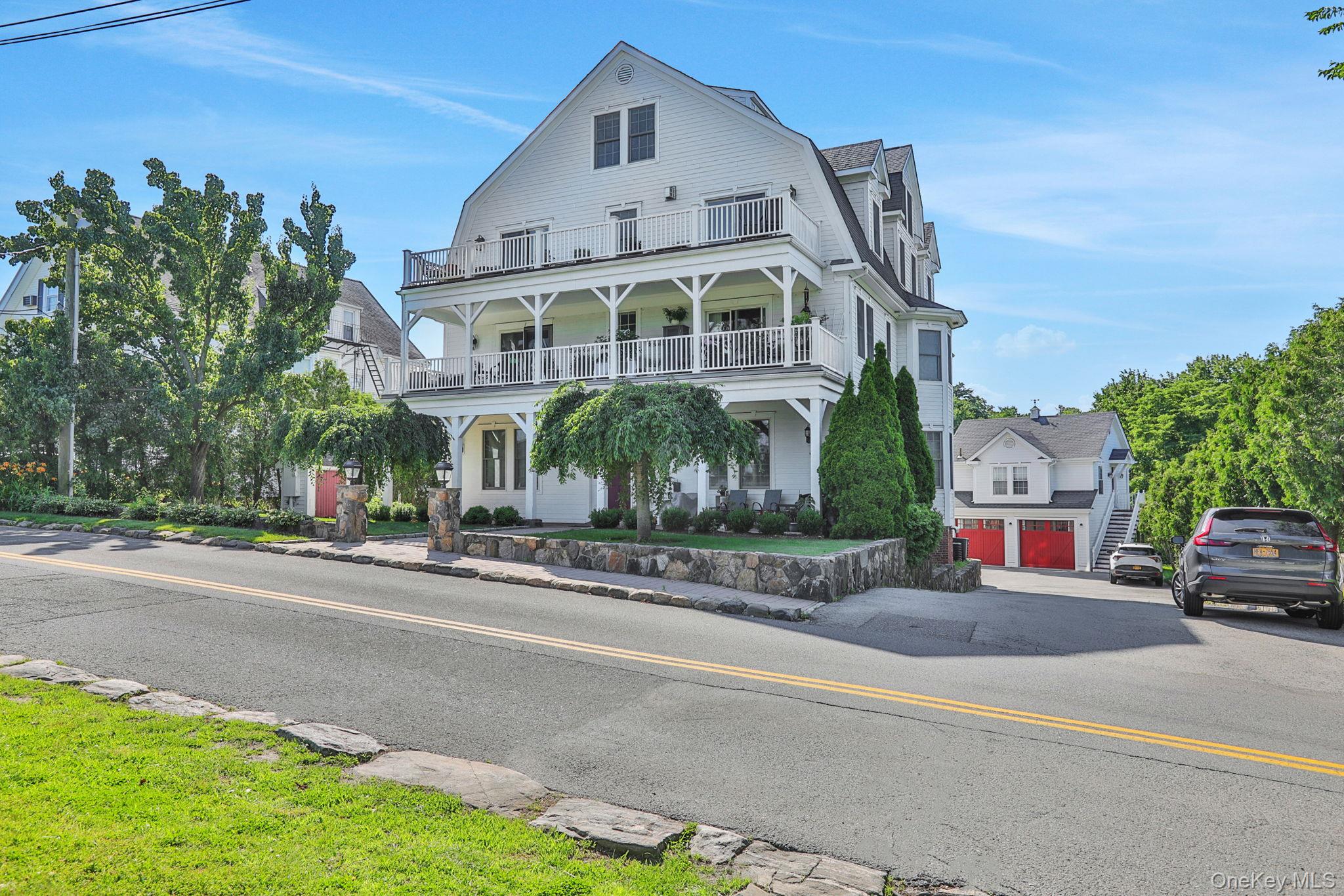 2 Harbor Lane, Unit 301 New Rochelle, NY 10805 - Photo 3 of 33 a front view of a building with street view