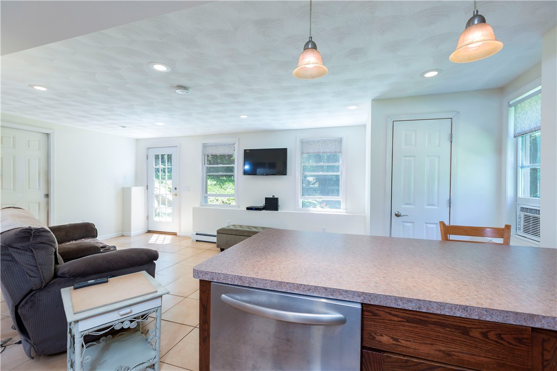 505 Old Coach Road Charlestown, RI 02813 - Photo 33 of 40 in-law living room/kitchen