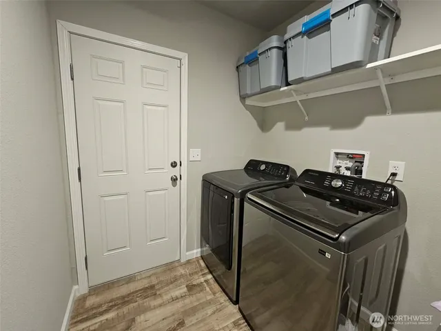 a refrigerator freezer sitting inside of a kitchen