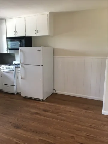 a bathroom with a bathtub and a sink