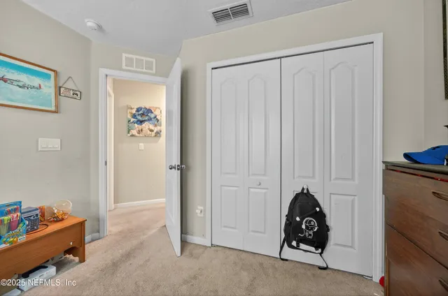 a view of room with toys and air conditioner duct