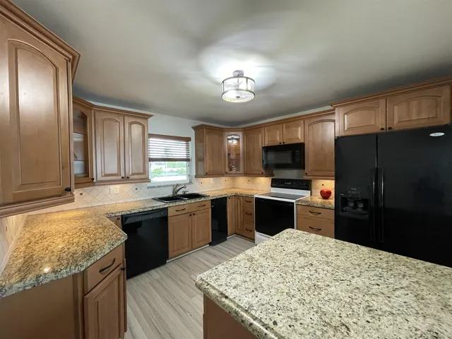 $555,000 | 401 Lake Shore Drive, Unit 301, Lake Park, FL 33403