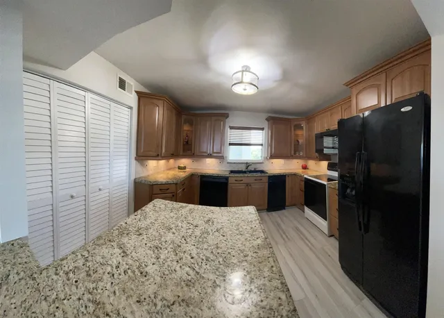 $555,000 | 401 Lake Shore Drive, Unit 301, Lake Park, FL 33403