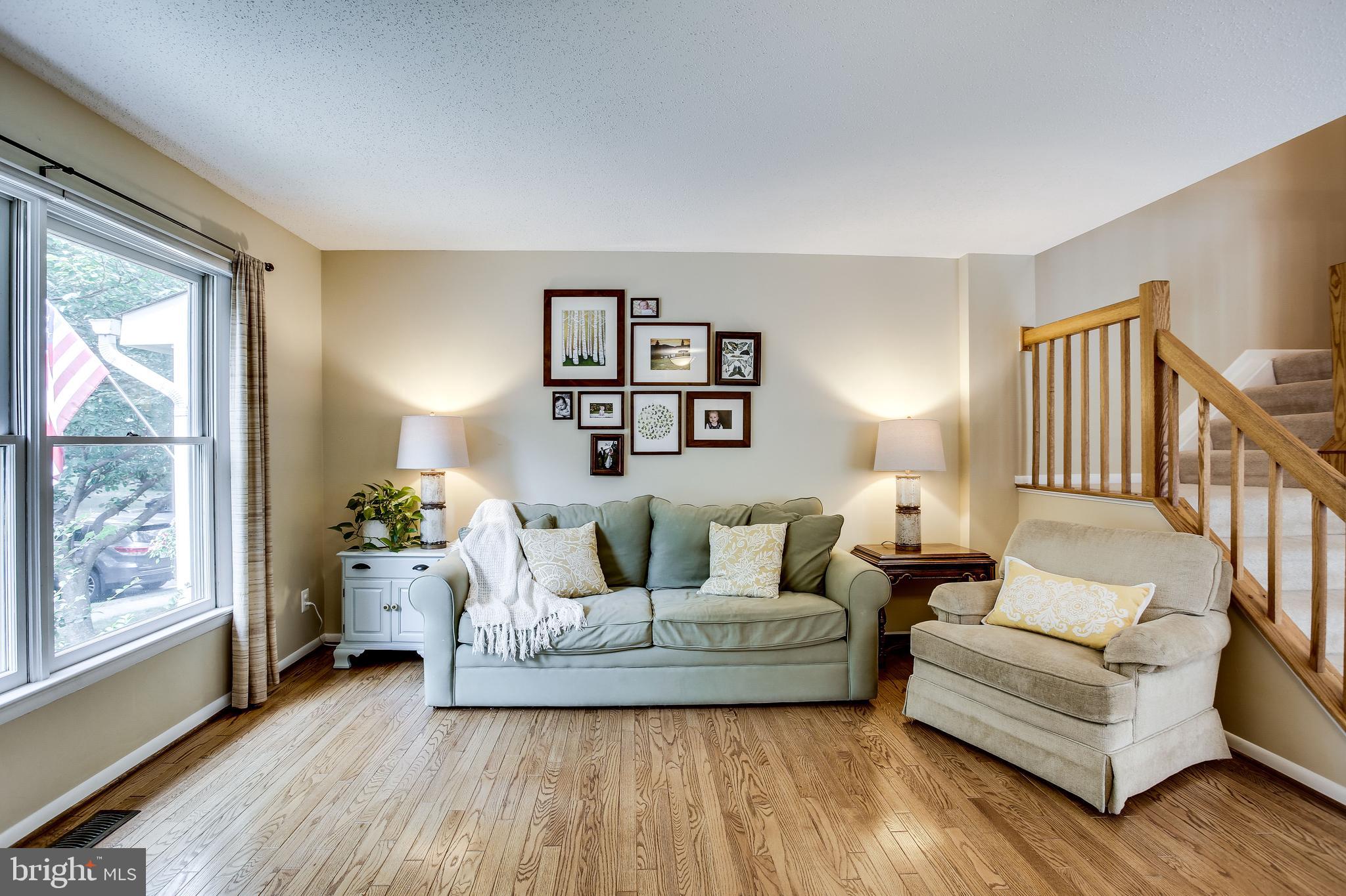 1630 Oak Spring Way Reston, VA 20190 - Photo 11 of 74 Lovely living room with beautiful hardwoods