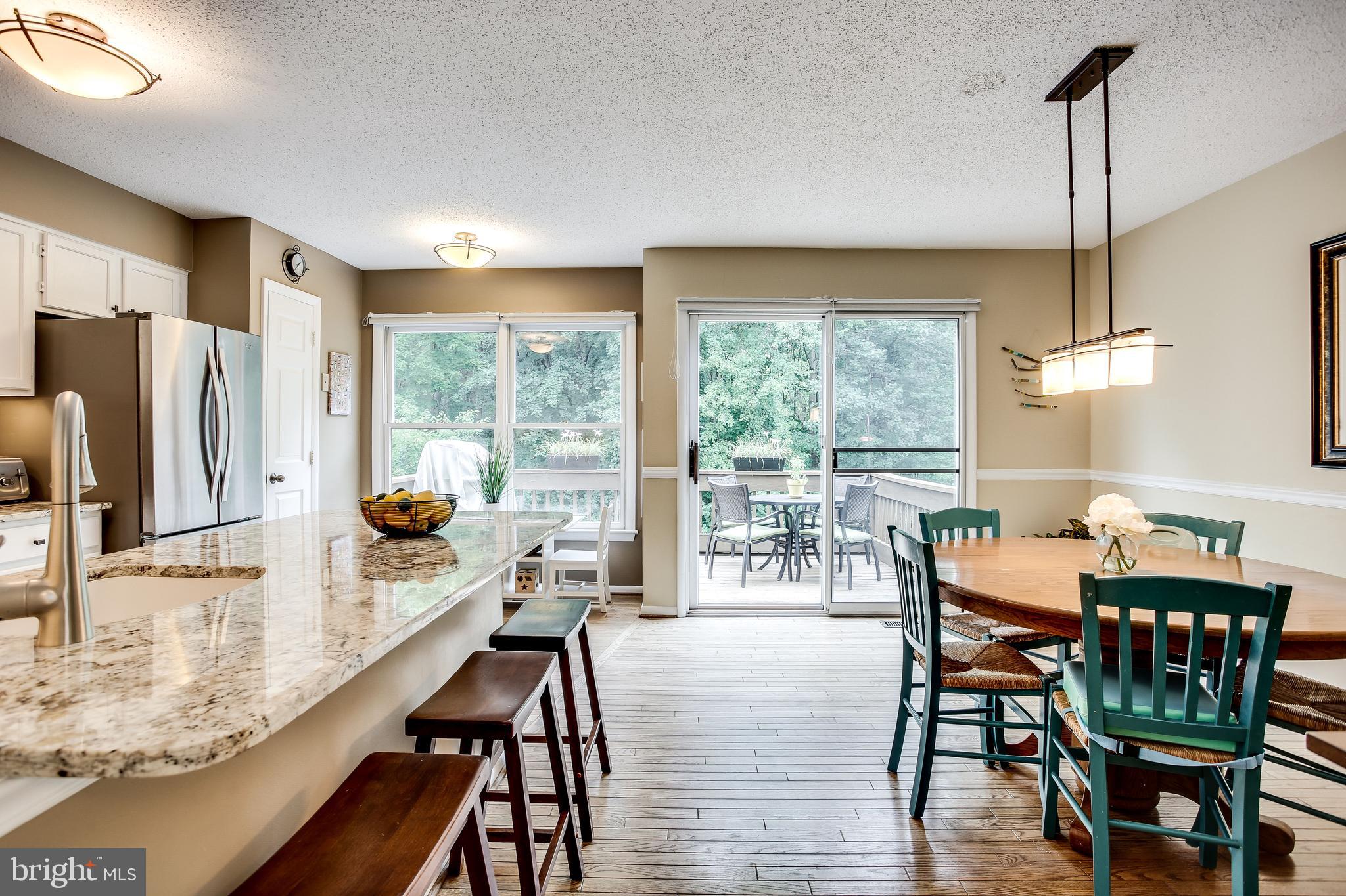 1630 Oak Spring Way Reston, VA 20190 - Photo 20 of 74 Breakfast bar & sun-lit kitchen