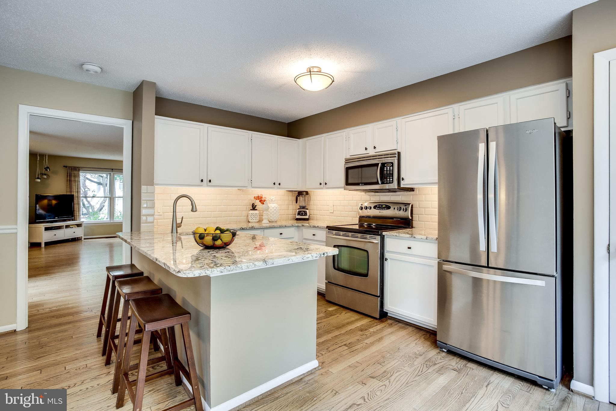 1630 Oak Spring Way Reston, VA 20190 - Photo 25 of 74 Stainless appliances & granite countertops!