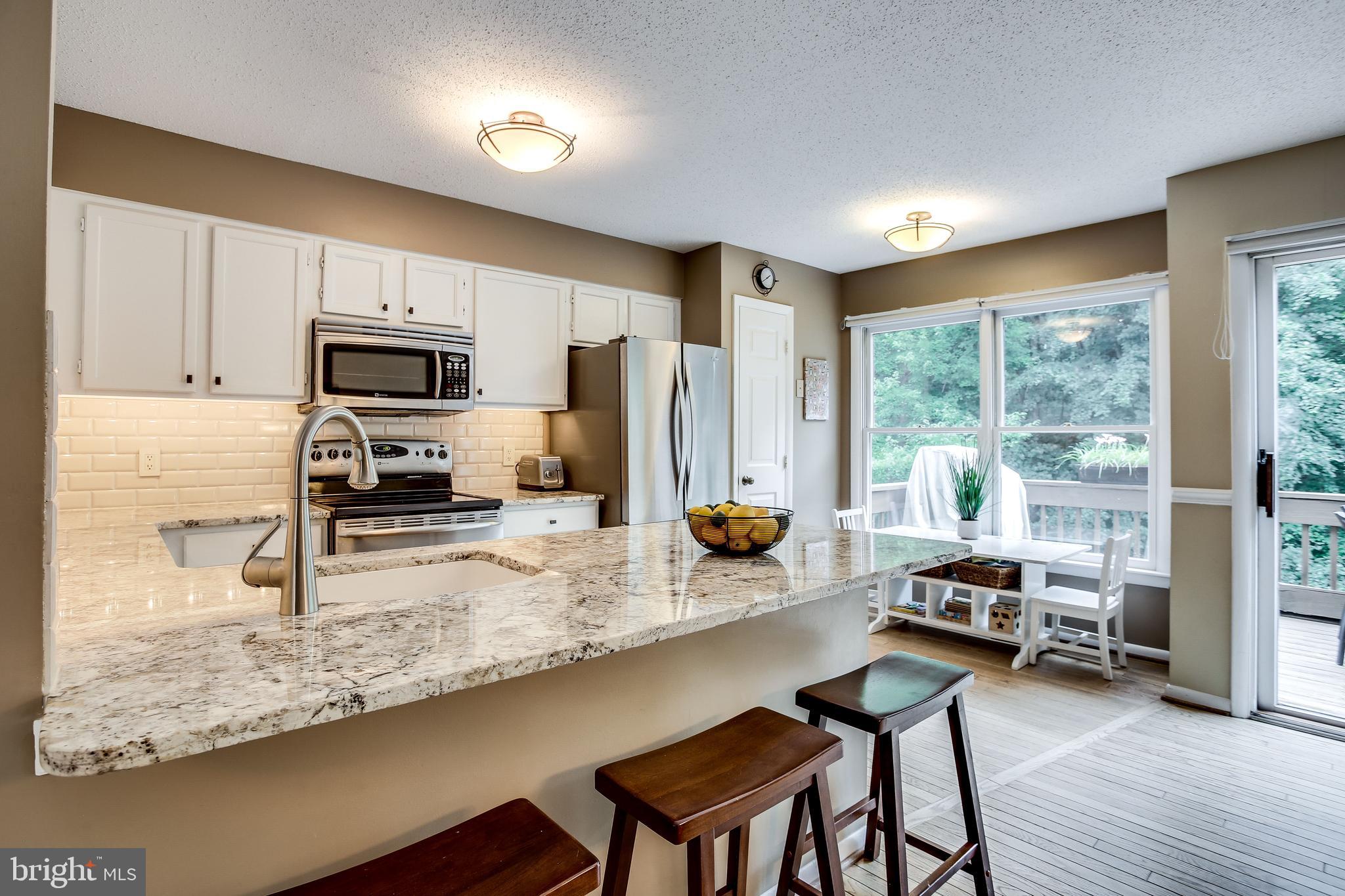 1630 Oak Spring Way Reston, VA 20190 - Photo 26 of 74 On-trend subway tile backsplash!