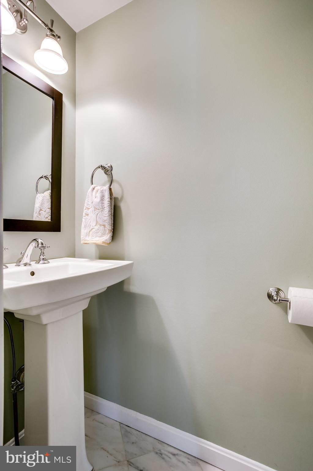 1630 Oak Spring Way Reston, VA 20190 - Photo 10 of 74 Renovated powder room with pedestal sink