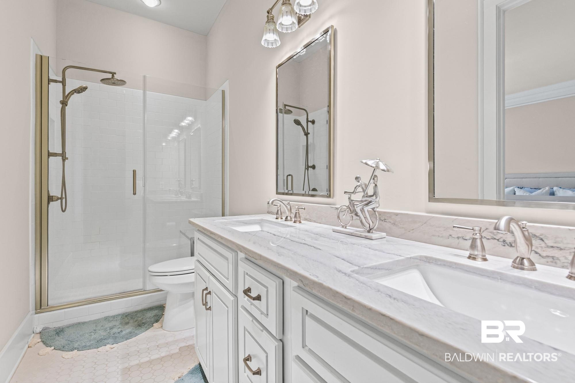 701 Dauphin Street, Unit A Mobile, AL 36602 - Photo 23 of 31 Double vanity with stone countertop and undermount sinks