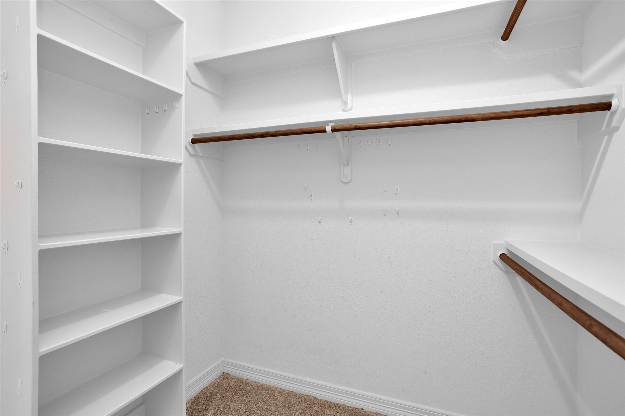 111 Cove Place Montgomery, TX 77356 - Photo 16 of 29 a view of an empty walk in closet