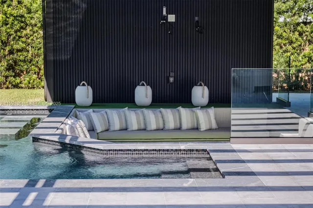 a view of a balcony with chair and table