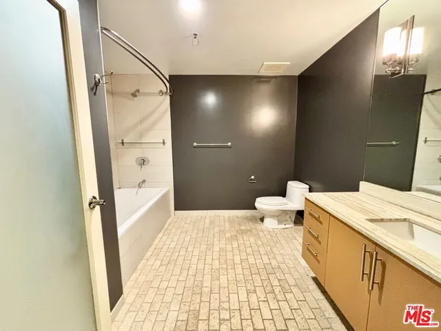 a view of swimming pool and outdoor seating