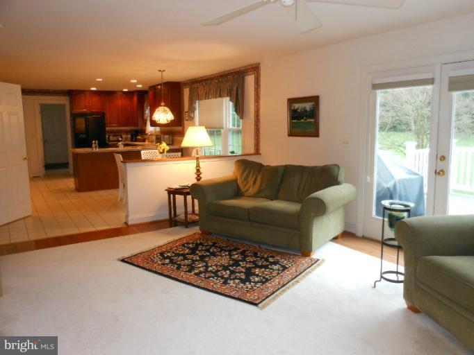 3603 Jackson Cabin Road Phoenix, MD 21131 - Photo 14 of 30 a living room with furniture and a large window