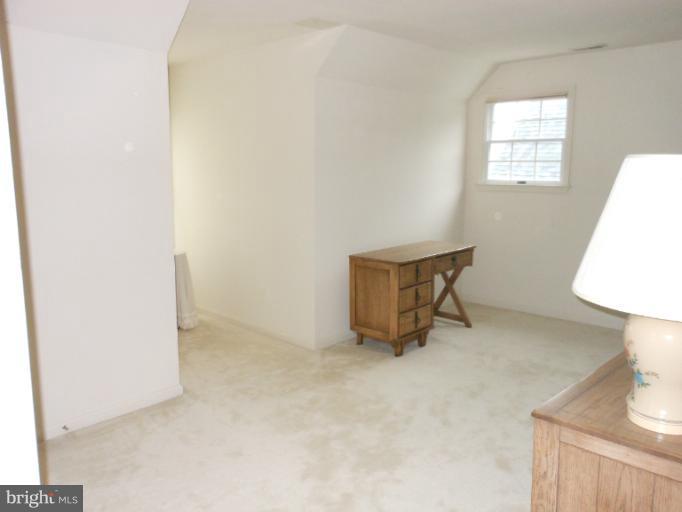 3603 Jackson Cabin Road Phoenix, MD 21131 - Photo 3 of 30 a room with a table and a lamp