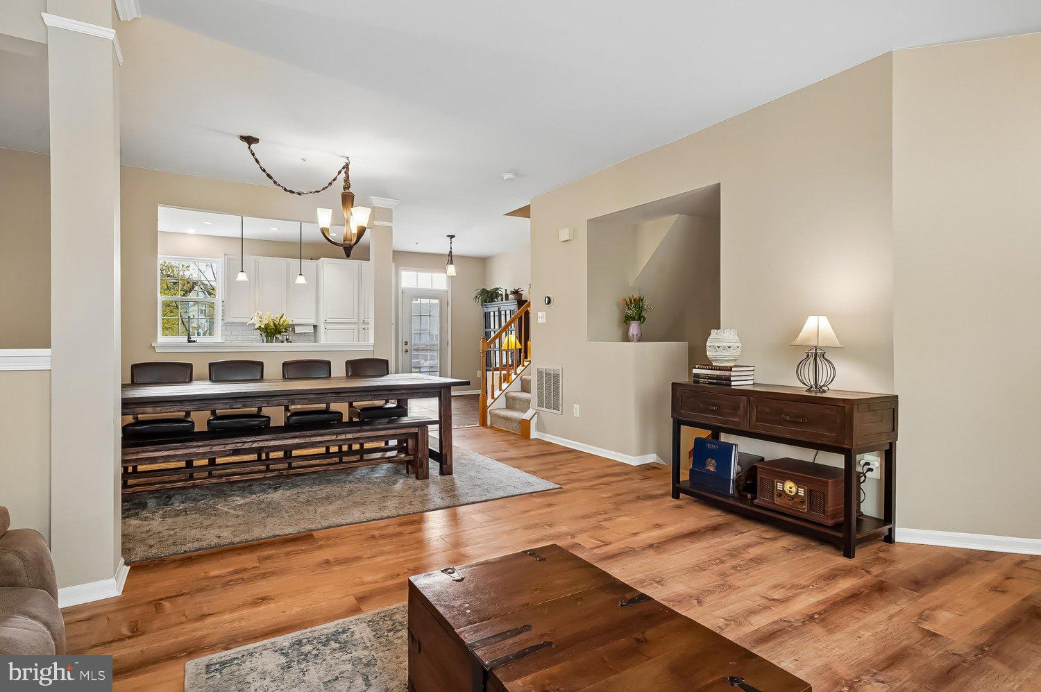 3757 Glebe Meadow Way Edgewater, MD 21037 - Photo 11 of 61 Inviting open space with warm wooden tones.