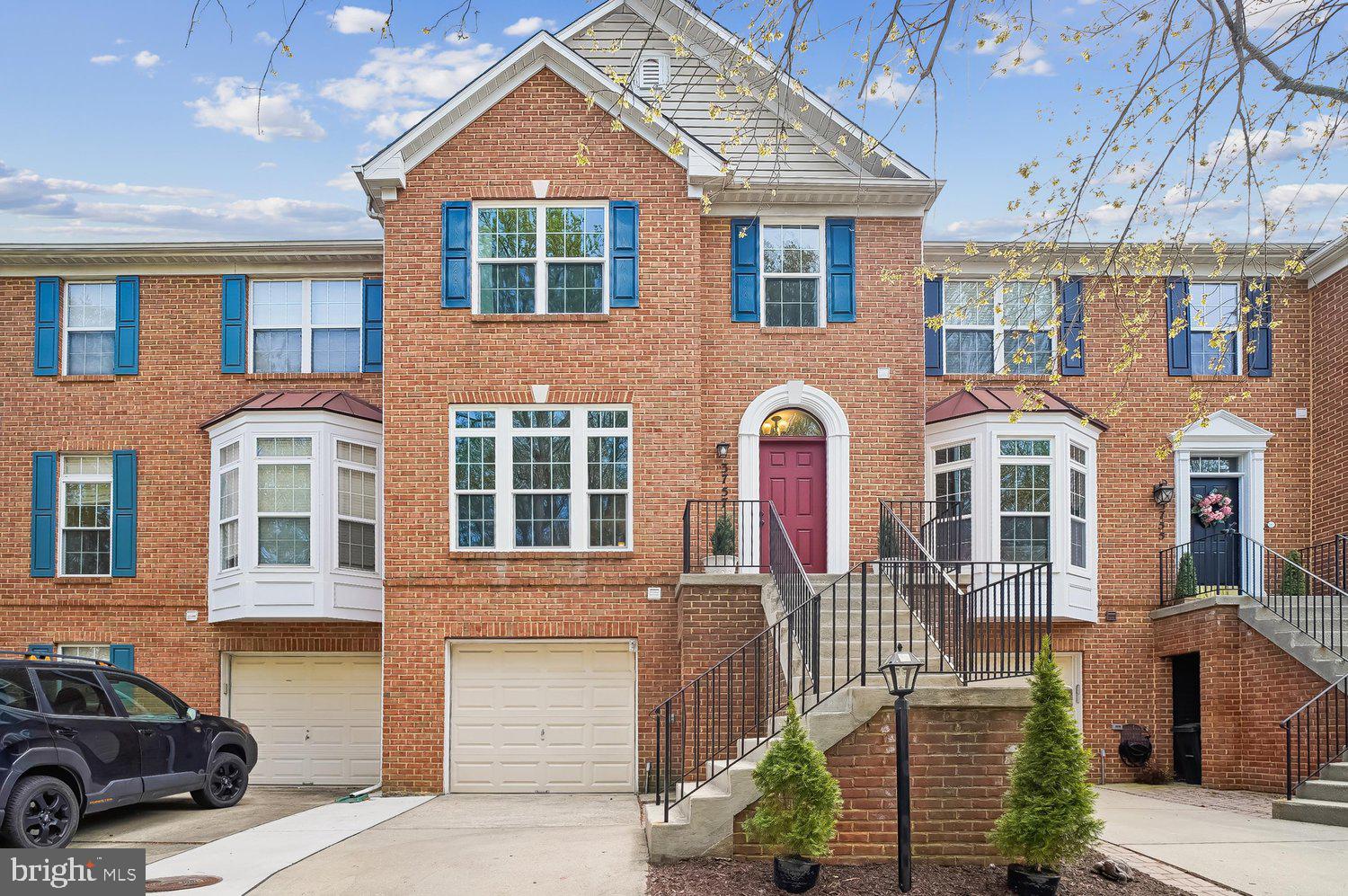 3757 Glebe Meadow Way Edgewater, MD 21037 - Photo 2 of 61 Charming brick townhouse with vibrant accents.