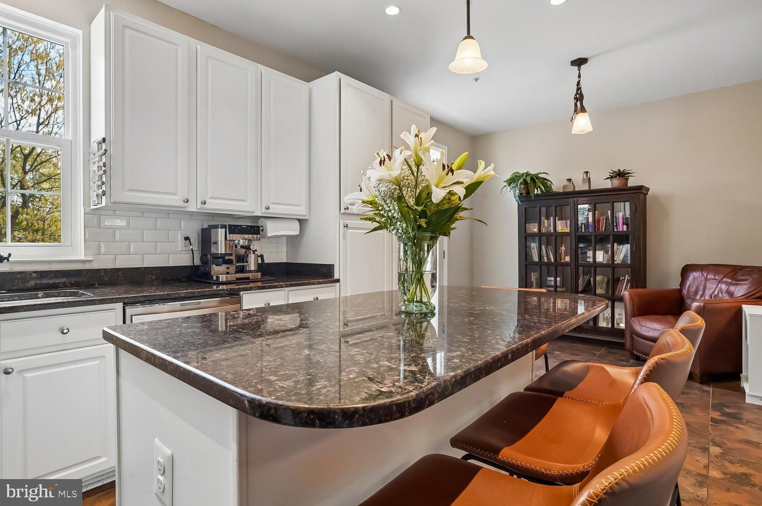 3757 Glebe Meadow Way Edgewater, MD 21037 - Photo 23 of 61 Bright kitchen with elegant floral centerpiece.