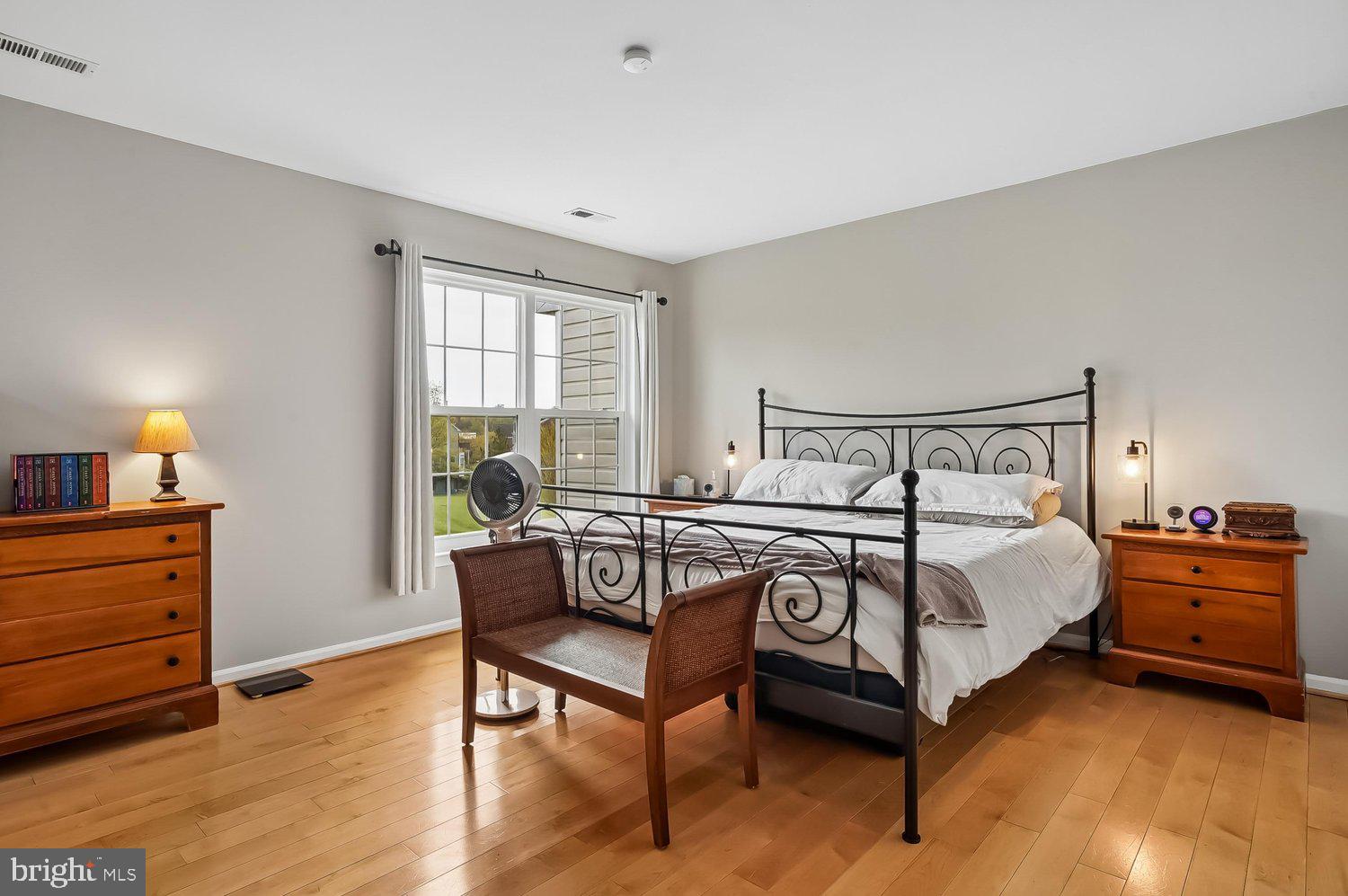 3757 Glebe Meadow Way Edgewater, MD 21037 - Photo 29 of 61 Serene bedroom with natural light and charm.