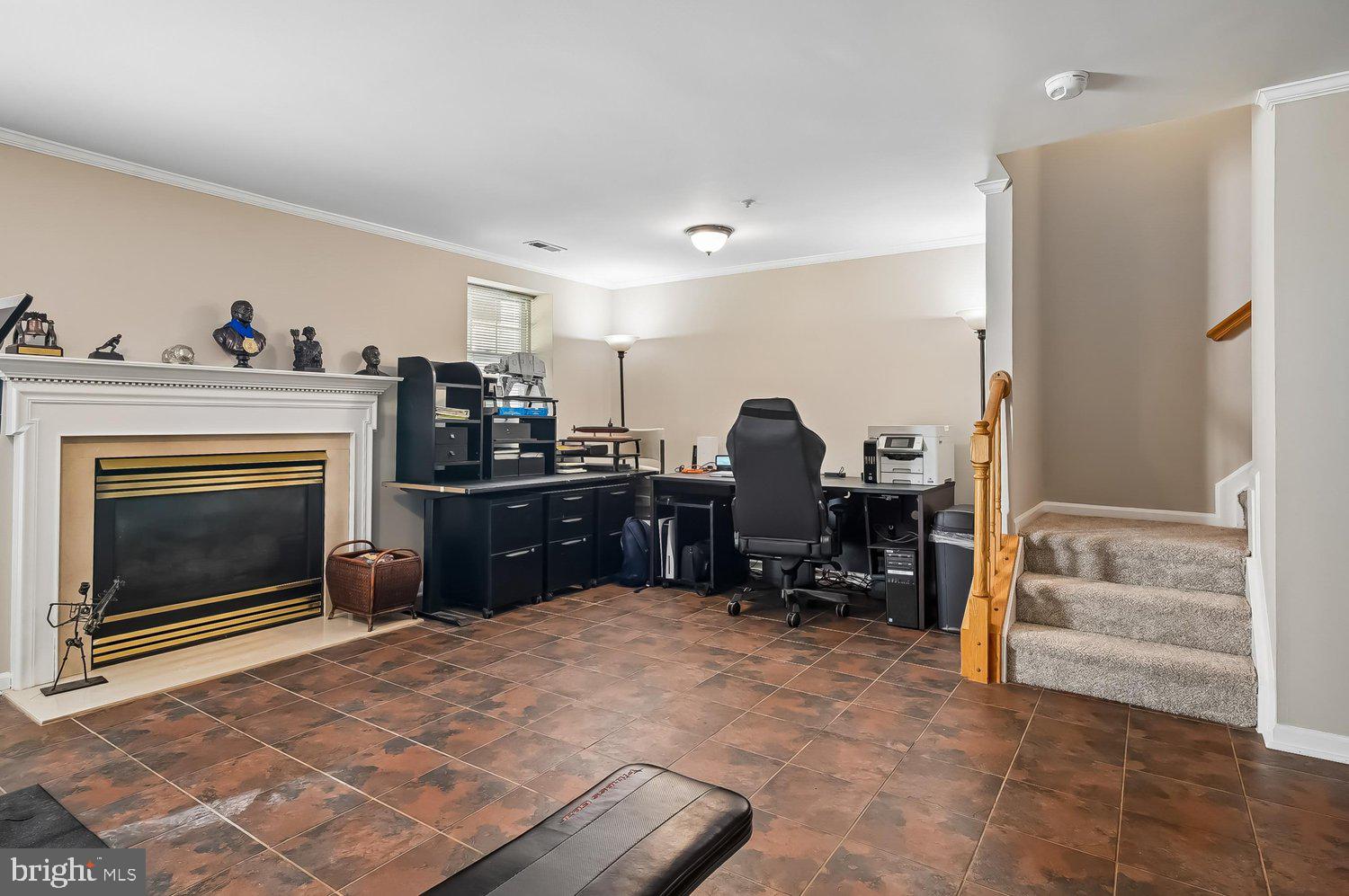 3757 Glebe Meadow Way Edgewater, MD 21037 - Photo 41 of 61 Spacious home office with elegant fireplace.