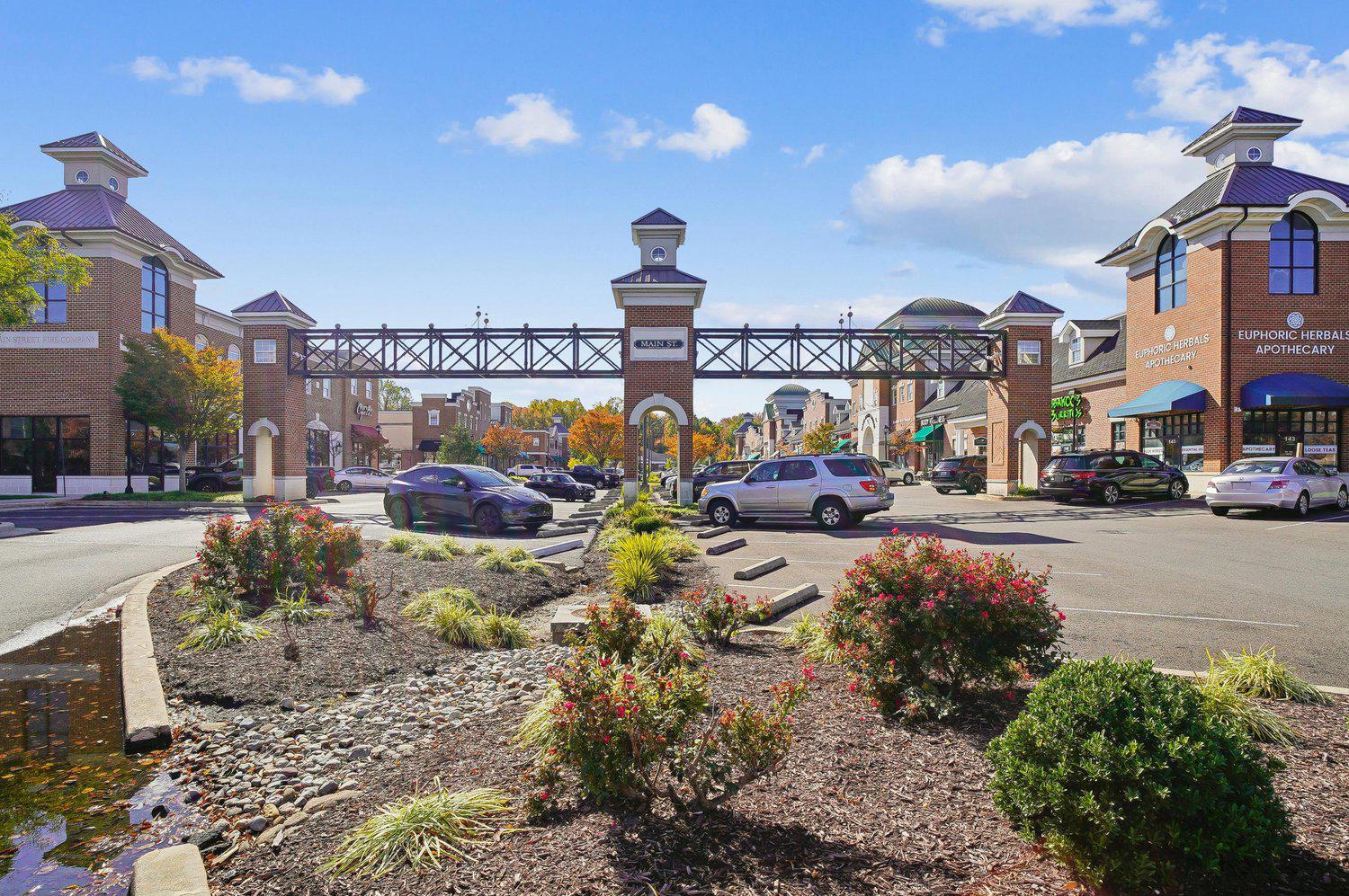 3757 Glebe Meadow Way Edgewater, MD 21037 - Photo 57 of 61 Local shopping plaza under a blue sky.