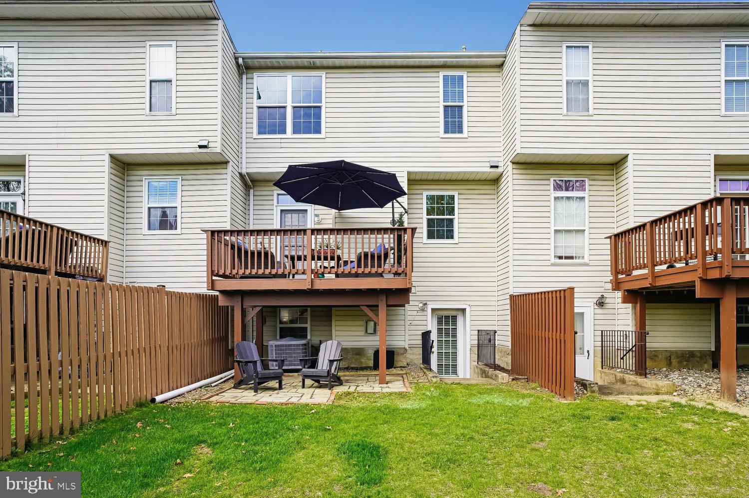 3757 Glebe Meadow Way Edgewater, MD 21037 - Photo 6 of 61 Charming backyard retreat with deck and greenery.