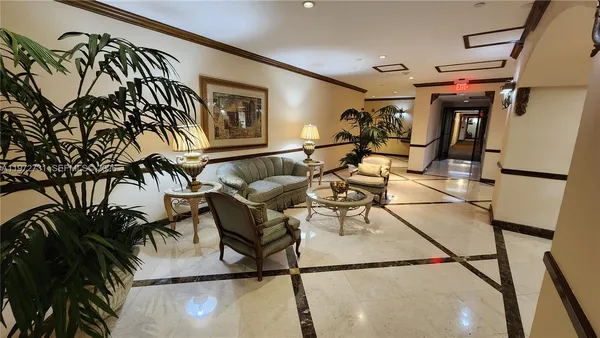 a living room with patio furniture