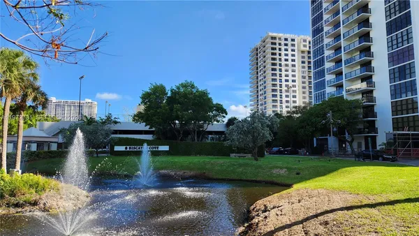 a view of a city with tall buildings