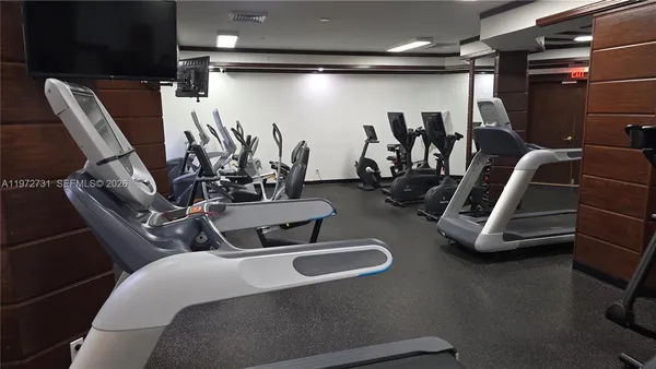 a view of a room with gym equipment