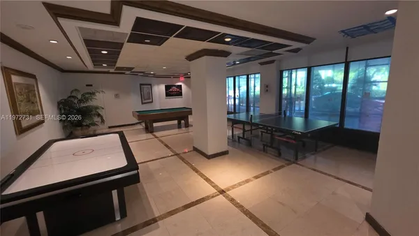 a room with lots of counter and windows